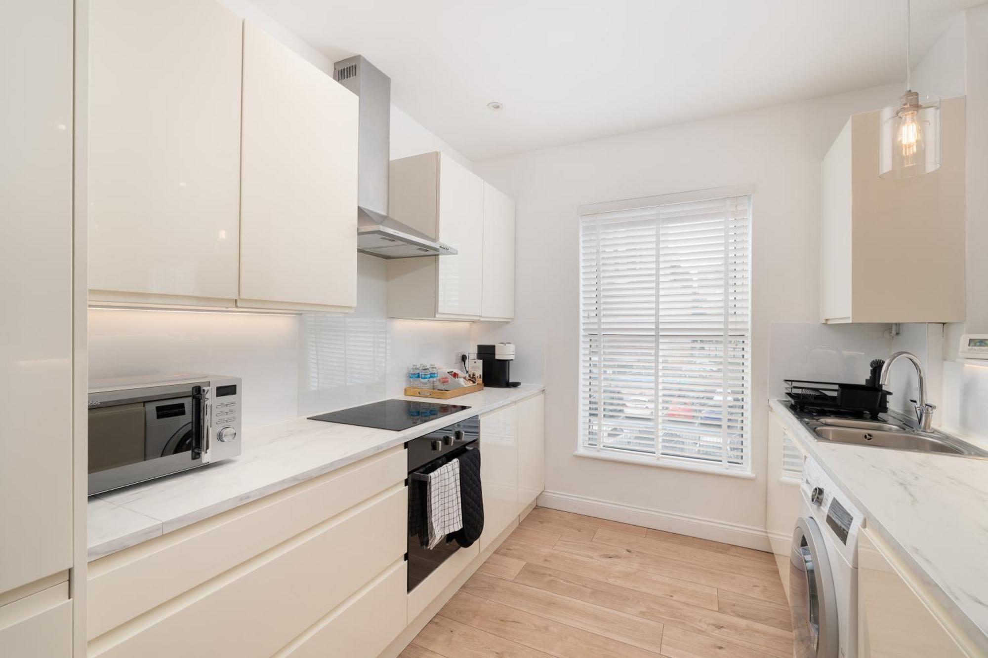 Hatter's Haven Luxury Appartment, Near Airport & Town Center